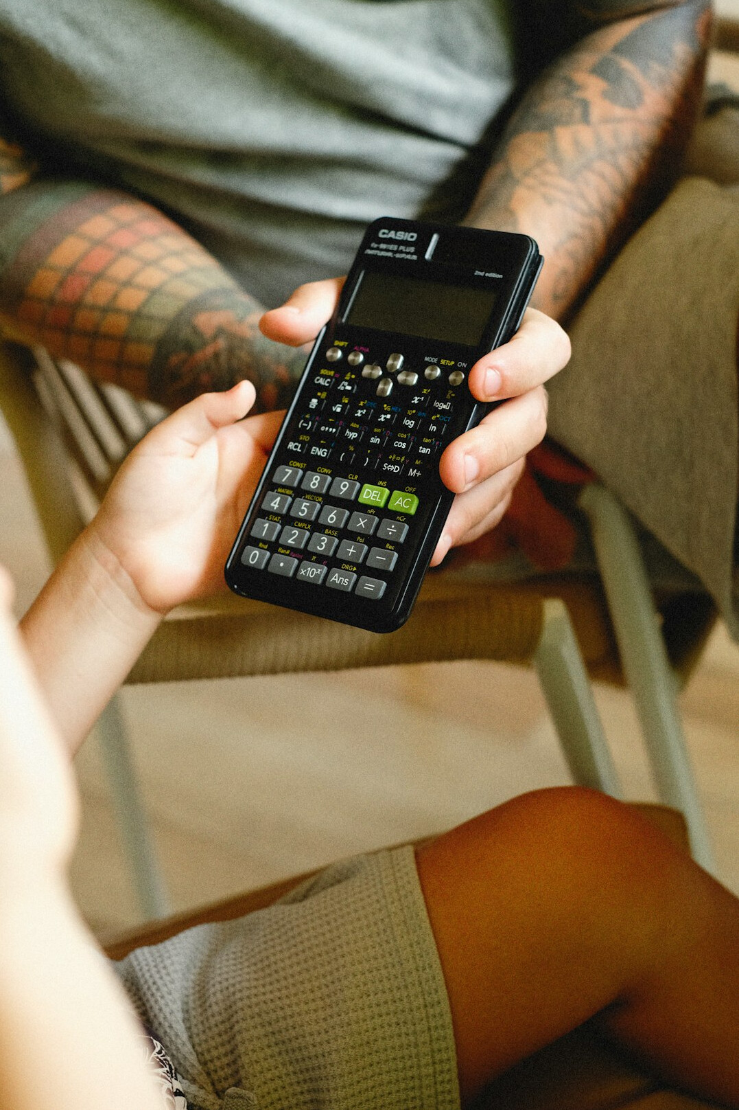 person using calculator