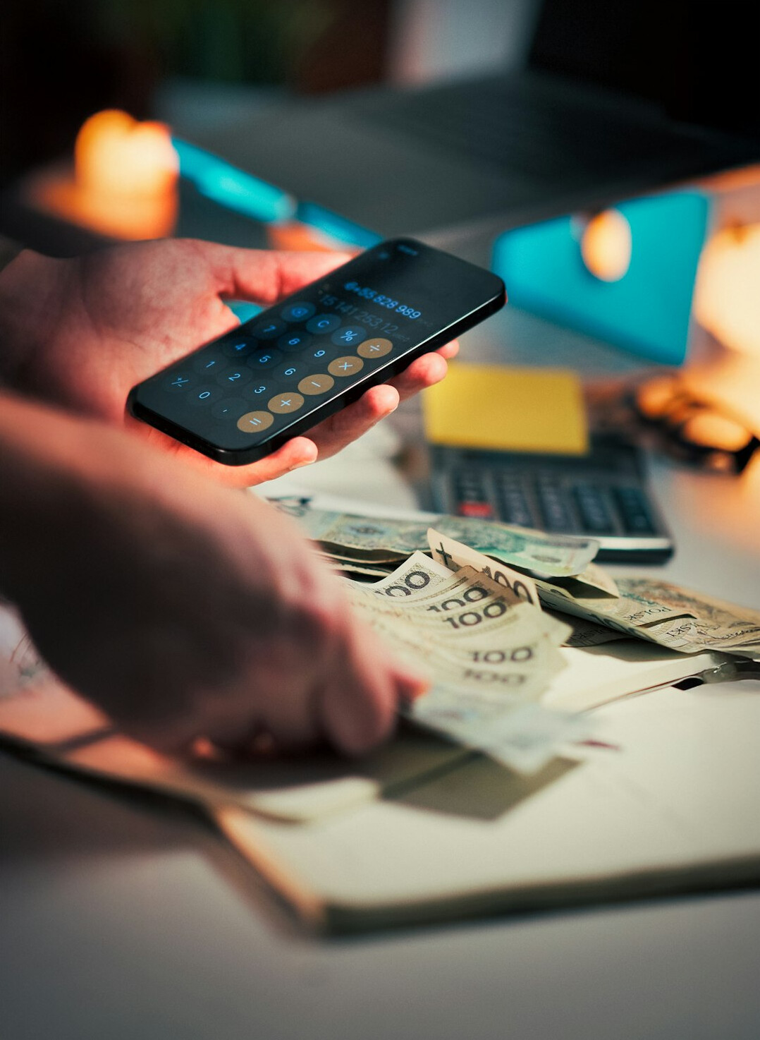 person calculating debt payments