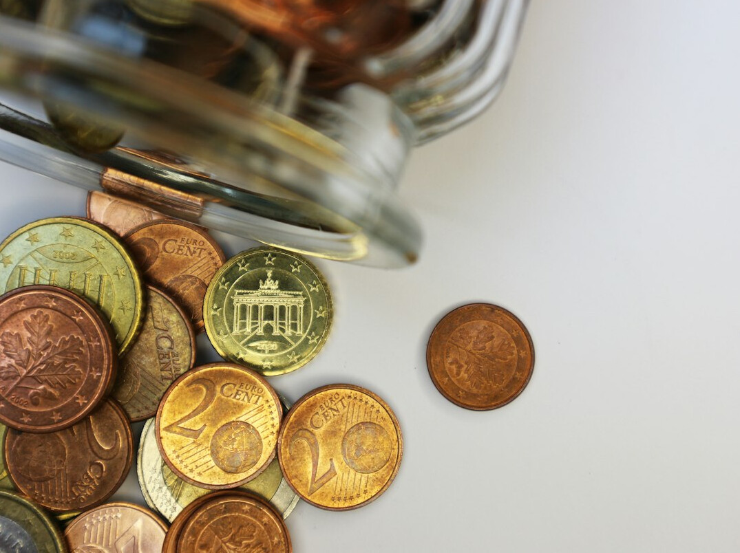 savings jar and calculator